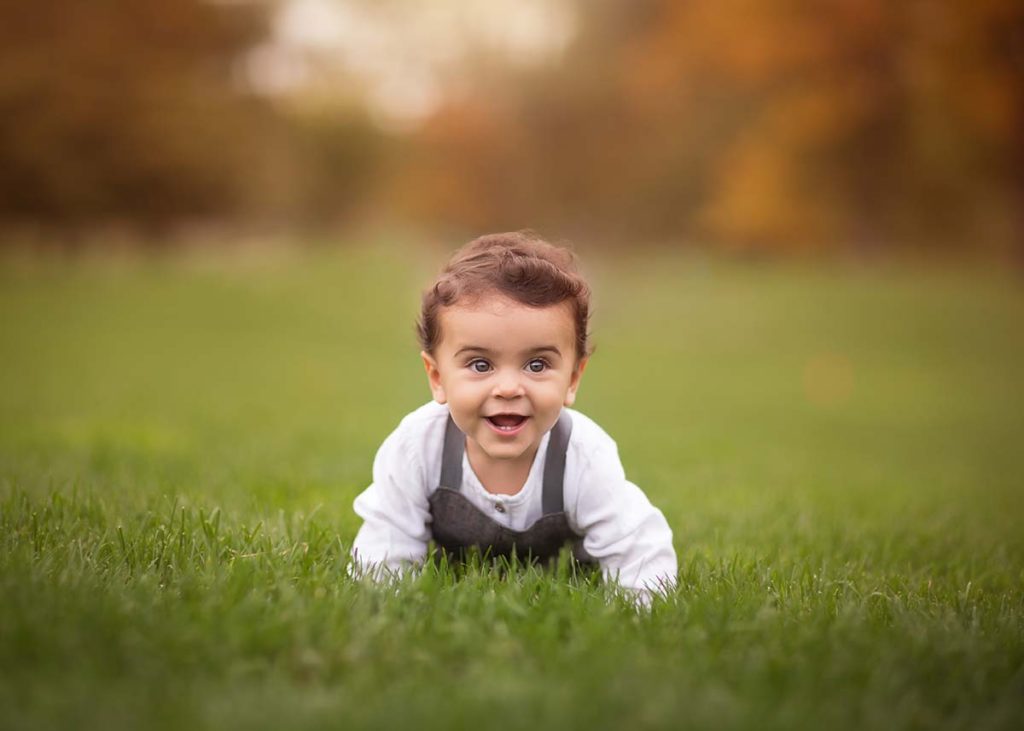 baby boy crawling grass Baby boy crawling in grass in Westchester County NY
