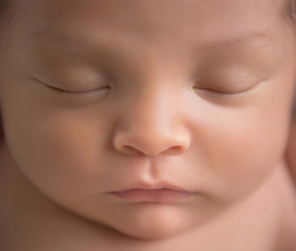 Closeup image of a newborn baby's face