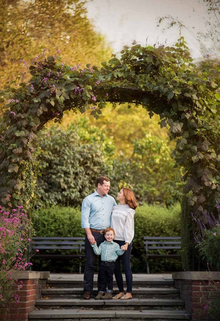 botanical gardens family Beautiful Westchester family with their son holding hands