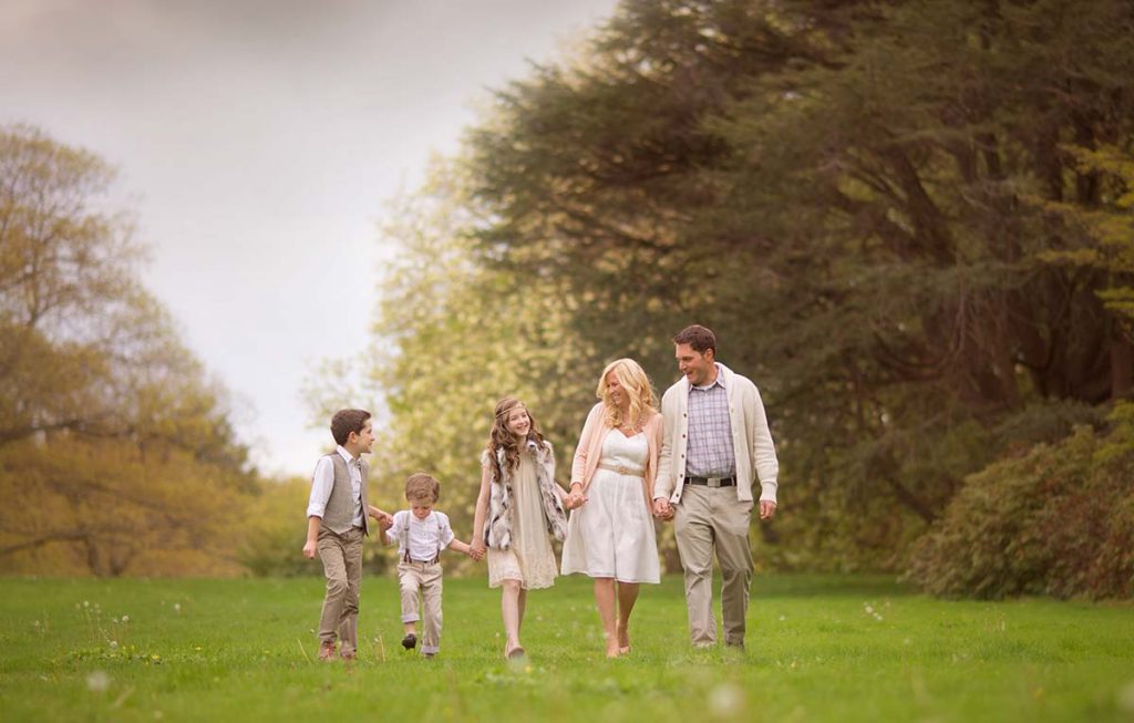 westchester ny family happy Happy family walking in a park during their photoshoot in Westchester