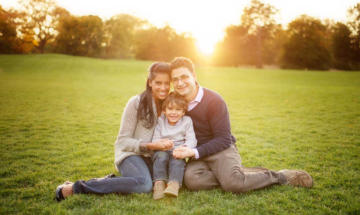 Beautiful family from Denver posing for a family photo during sunset