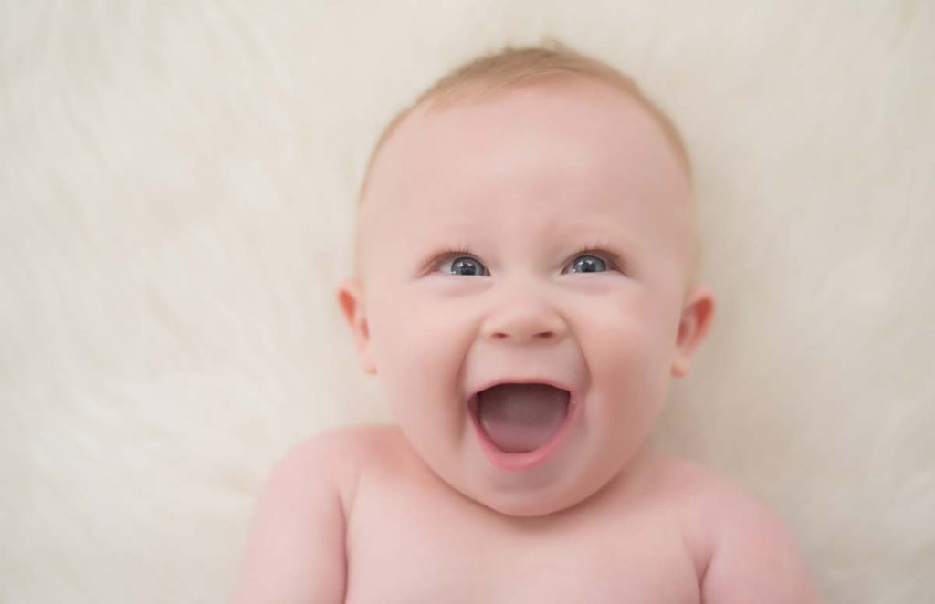 Sweet photo of a laughing baby