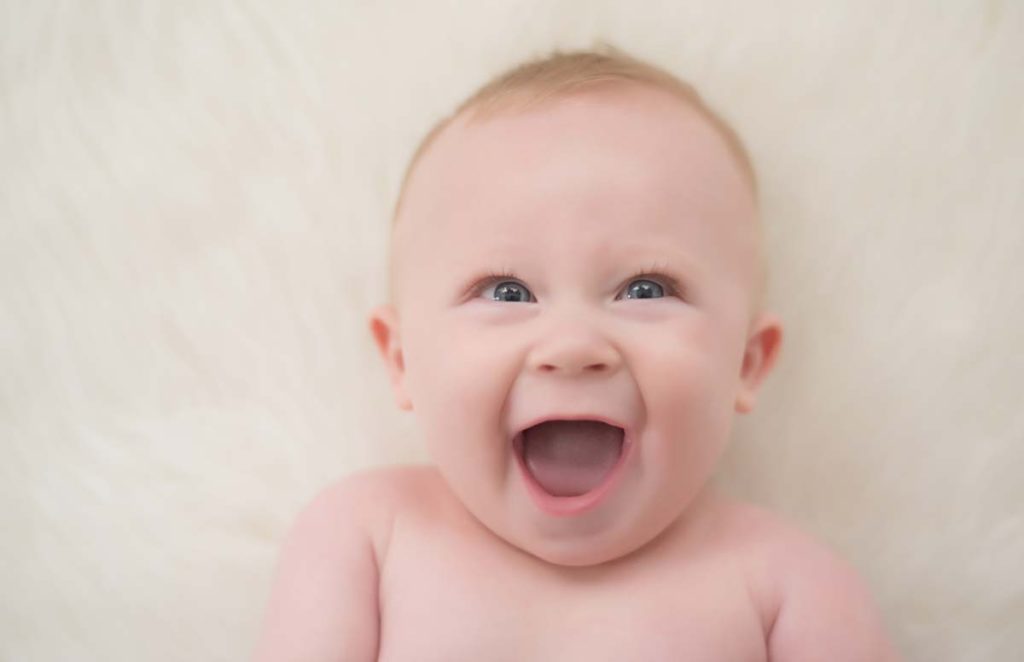 laughing baby boy Sweet photo of a laughing baby