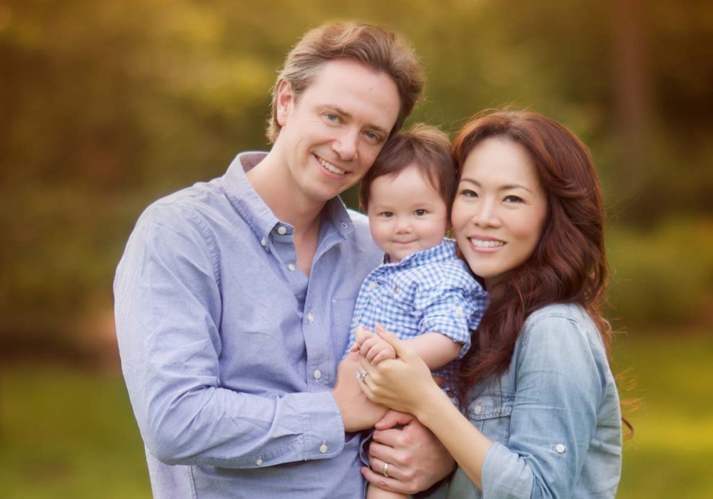 natural happy family portrait Modern family photo with a beautiful family set outdoors