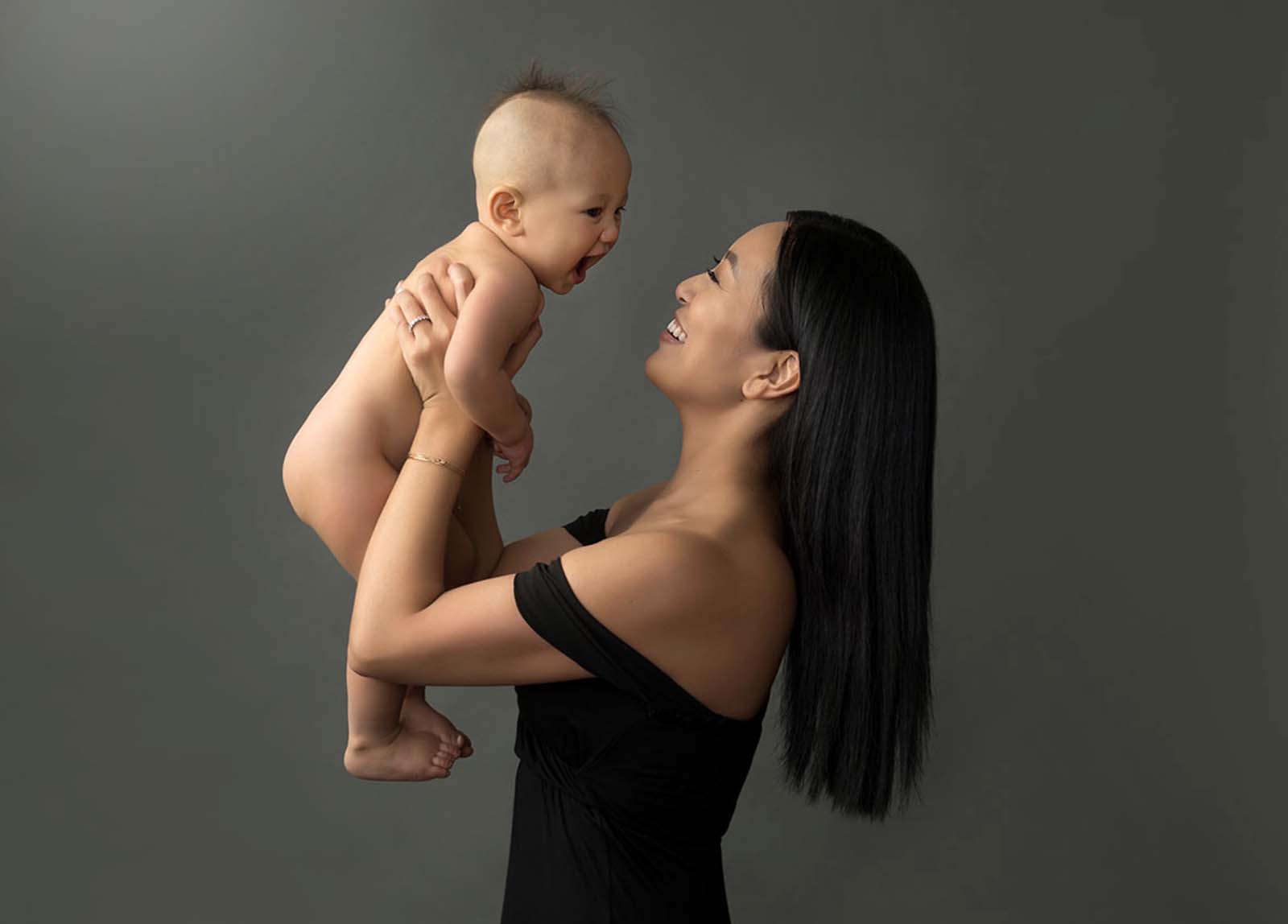 Mother and baby sharing laughs together - Today's Trends in baby photography 